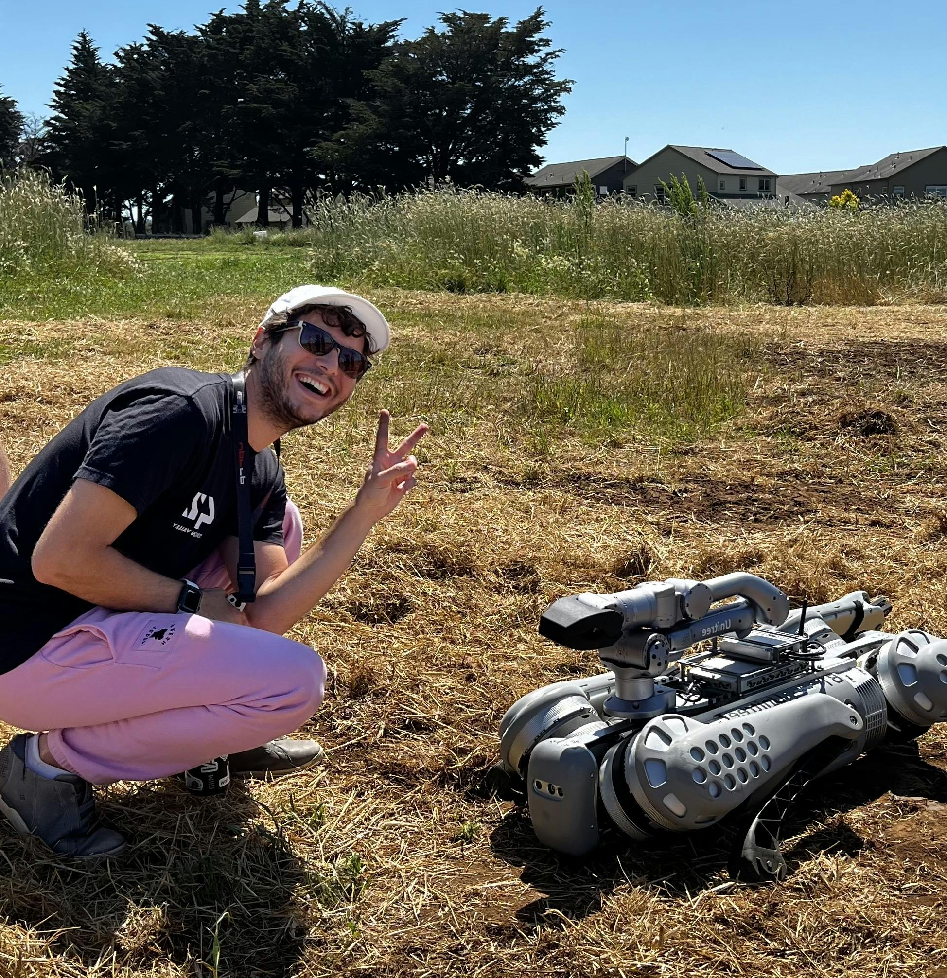 Picture of me and a robodog at UCSC
